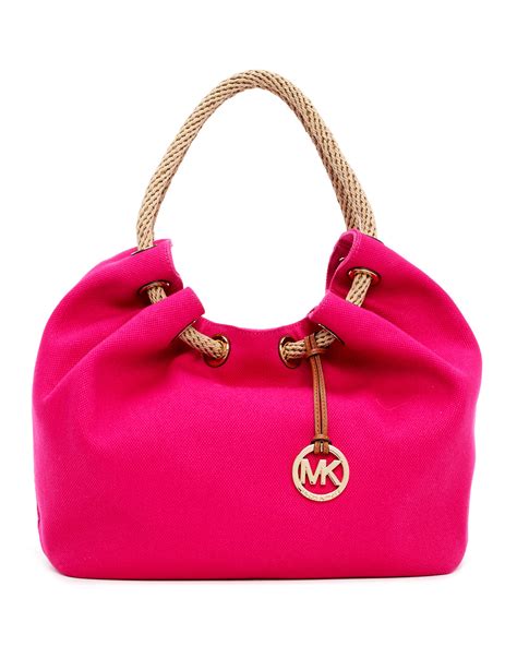 michael kors bright pink tote|Michael Kors pink suitcase.